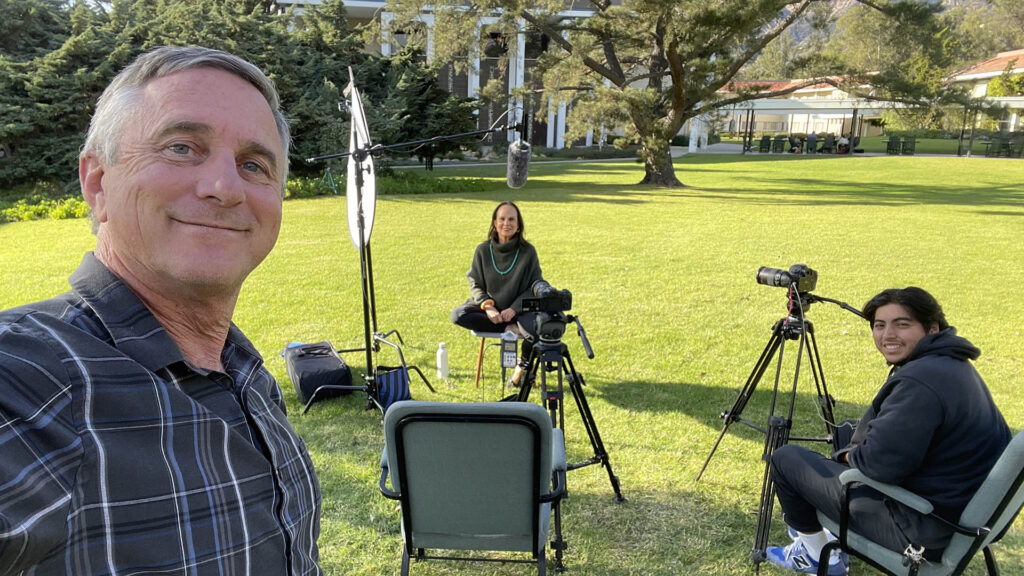 Director of photography, Jim Knowlton interviews an instructor to helpcreate an emotional marketing video for Pacifica Graduate Institute.